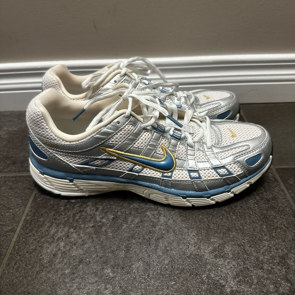 Nike White and Blue Running Shoes with Yellow Accents